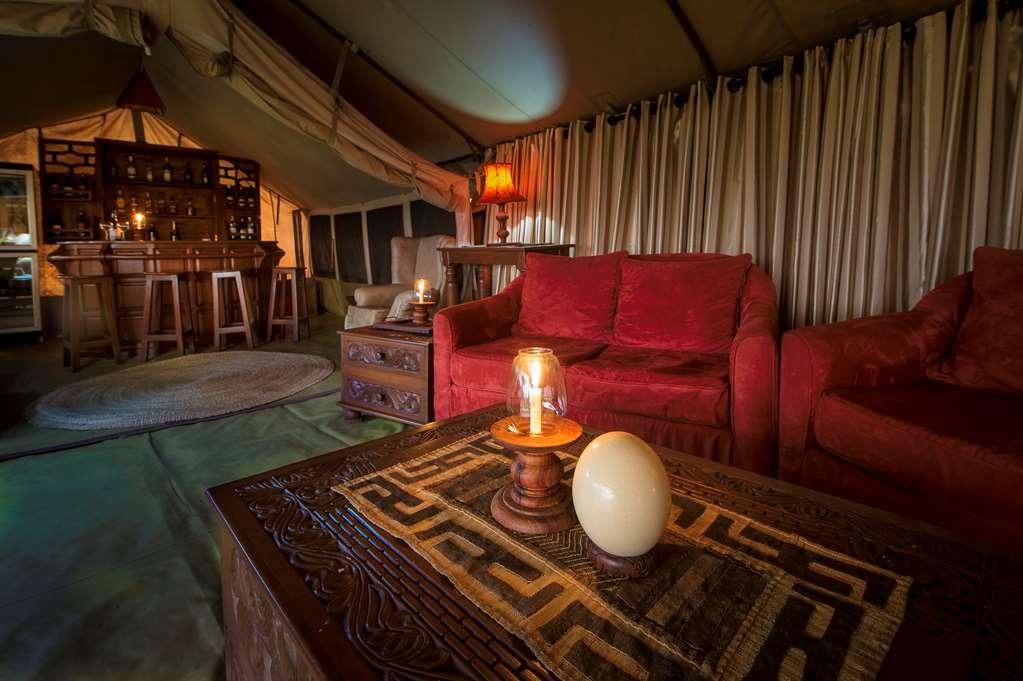 Karibu Camps And Lodges Lions Paw Ngorongoro Карату Ресторан фото