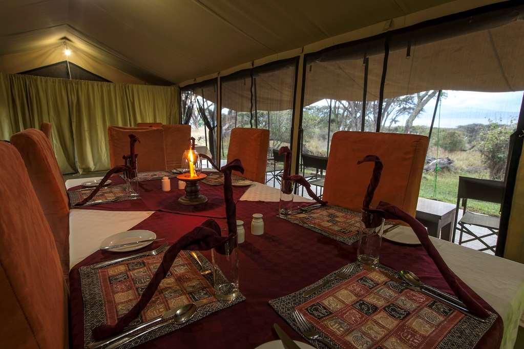 Karibu Camps And Lodges Lions Paw Ngorongoro Карату Ресторан фото
